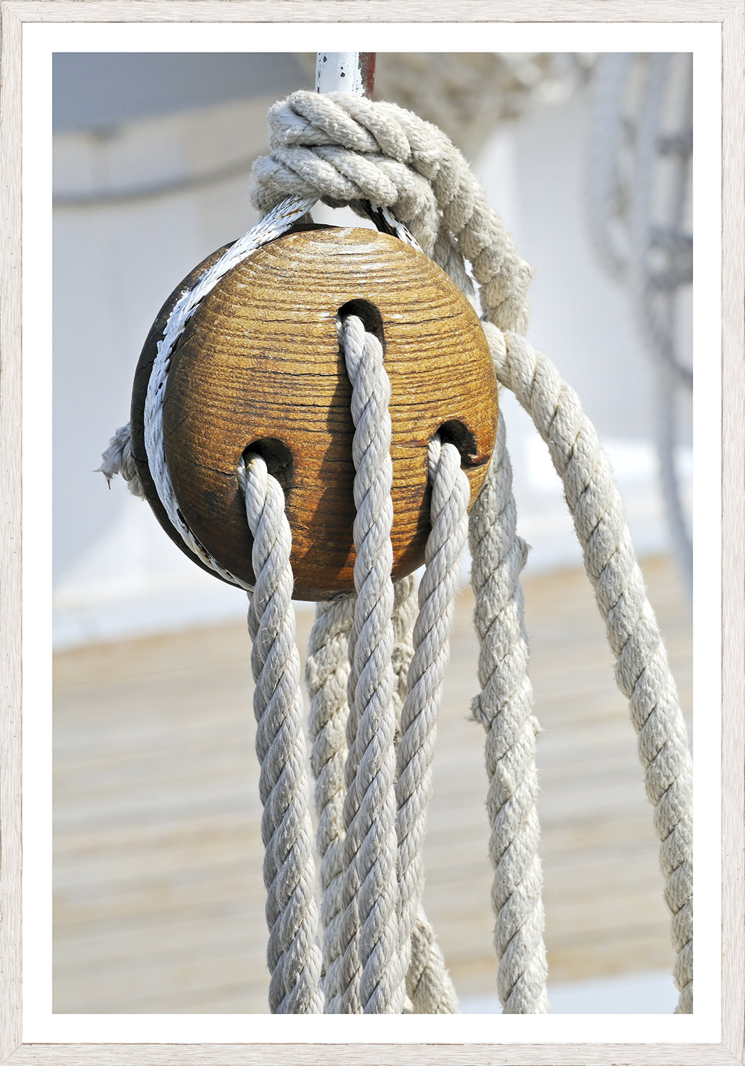 Nautical Blocks II wall art featuring a wooden pulley with ropes, showcasing a rustic maritime theme.