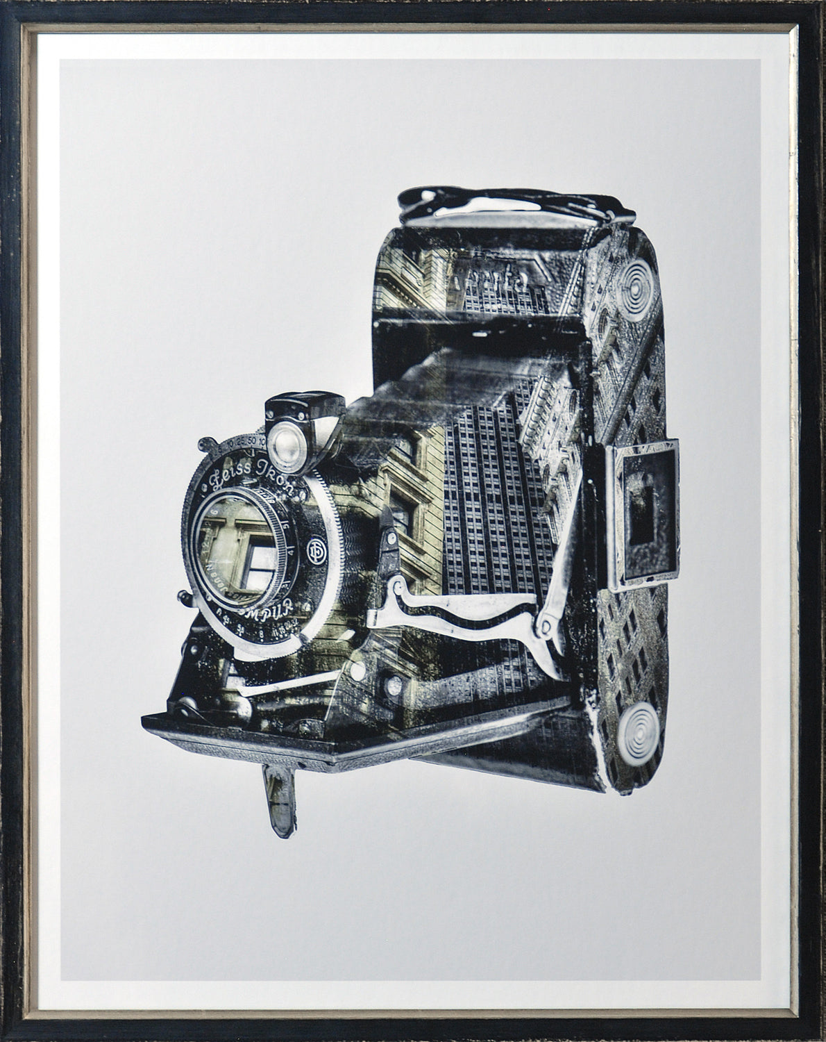 Vintage Camera I wall art featuring a detailed black and white camera design with urban elements.