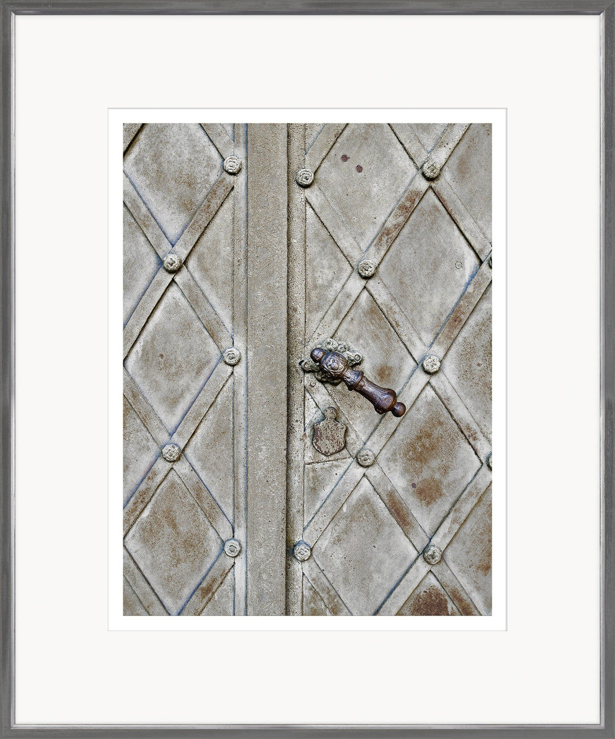 European Door Detail III wall art featuring a close-up of a textured, diamond-patterned door with a bronze handle.