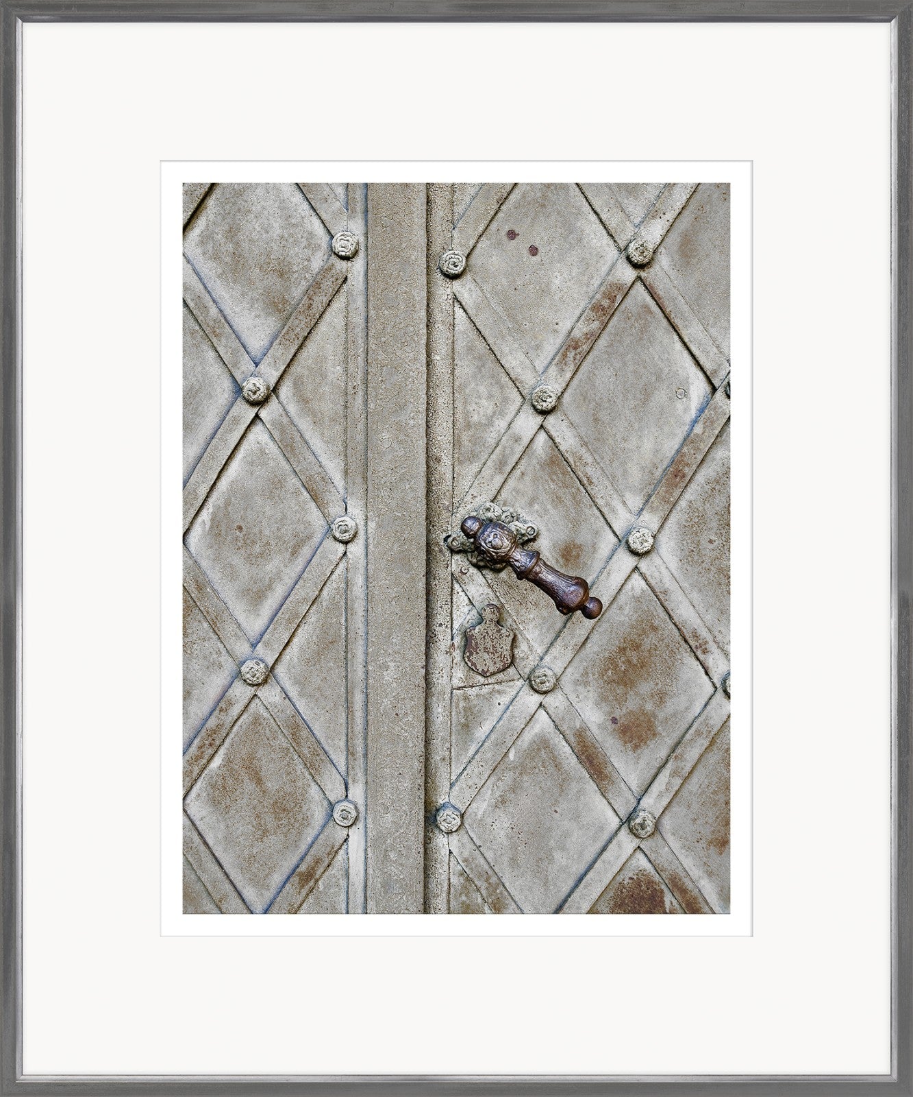 European Door Detail III wall art featuring a close-up of a textured, diamond-patterned door with a bronze handle.