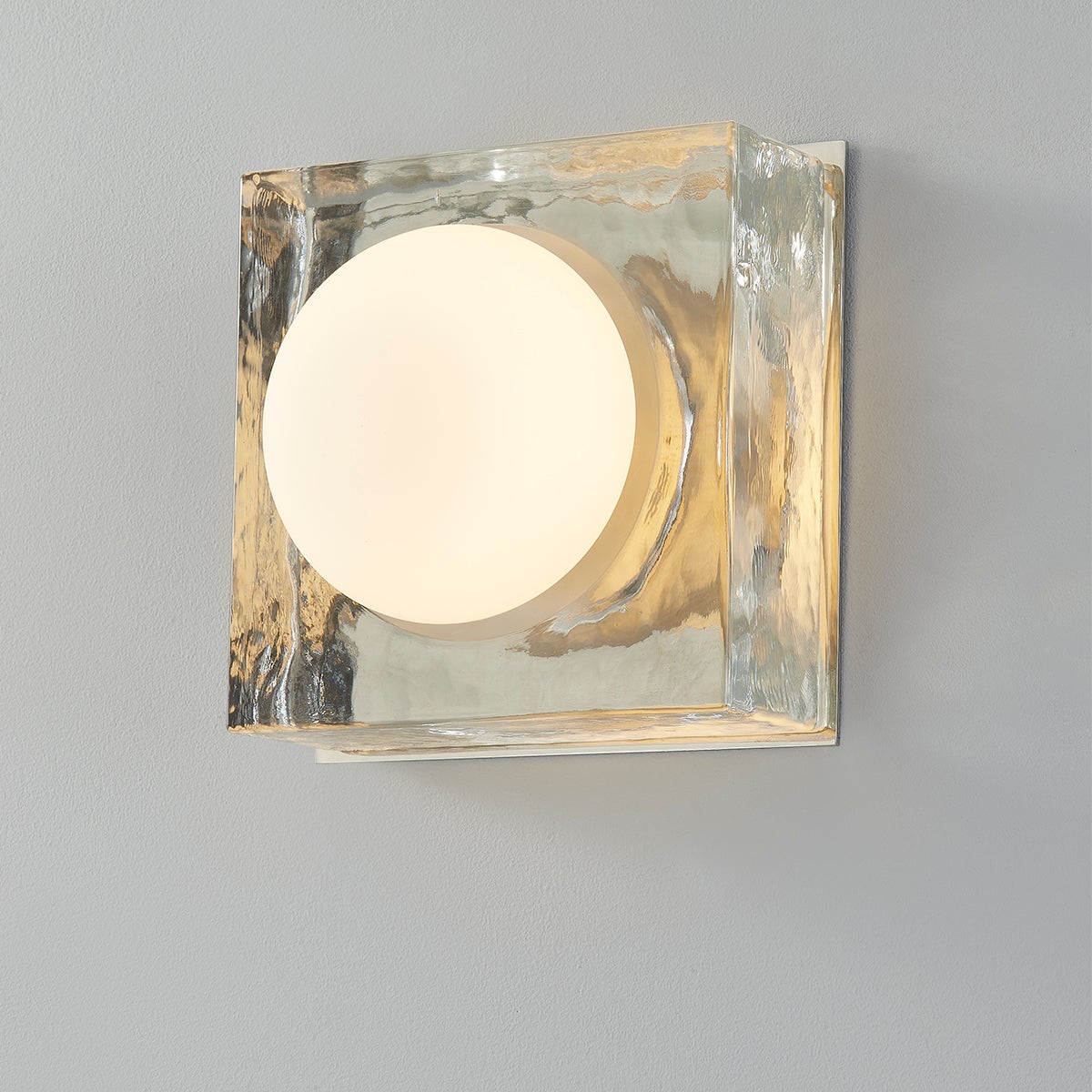 Close-up of the Mackay Wall Sconce 7.75" x 7.75" in polished nickel showing the arm curve and shade silhouette.