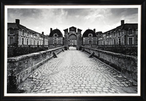 Chateau Saint-Aubin black and white wall art featuring a historic castle entrance and cobblestone path.