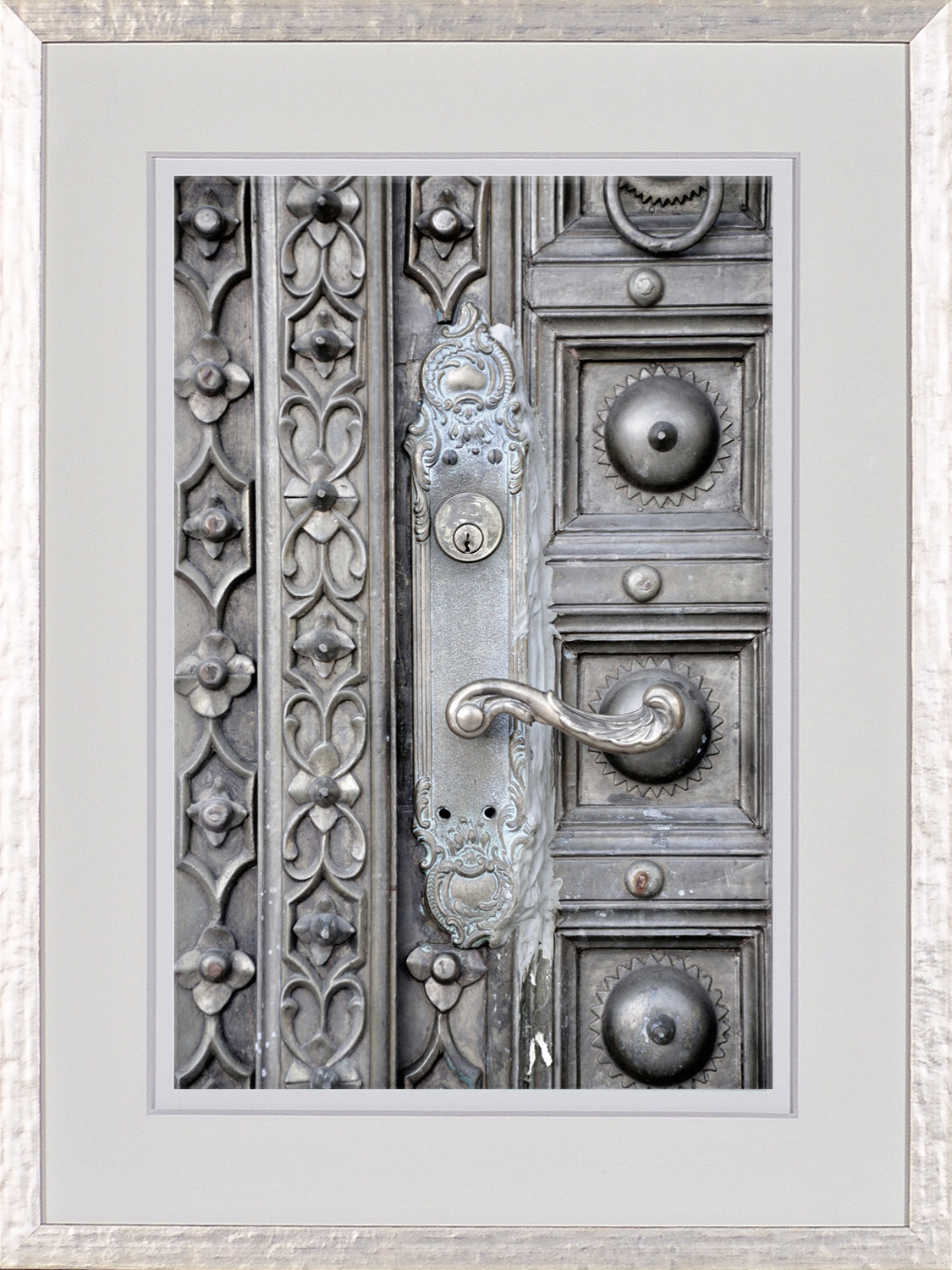 Timeworn Details VII wall art featuring intricate metal door design with ornate patterns and handle.