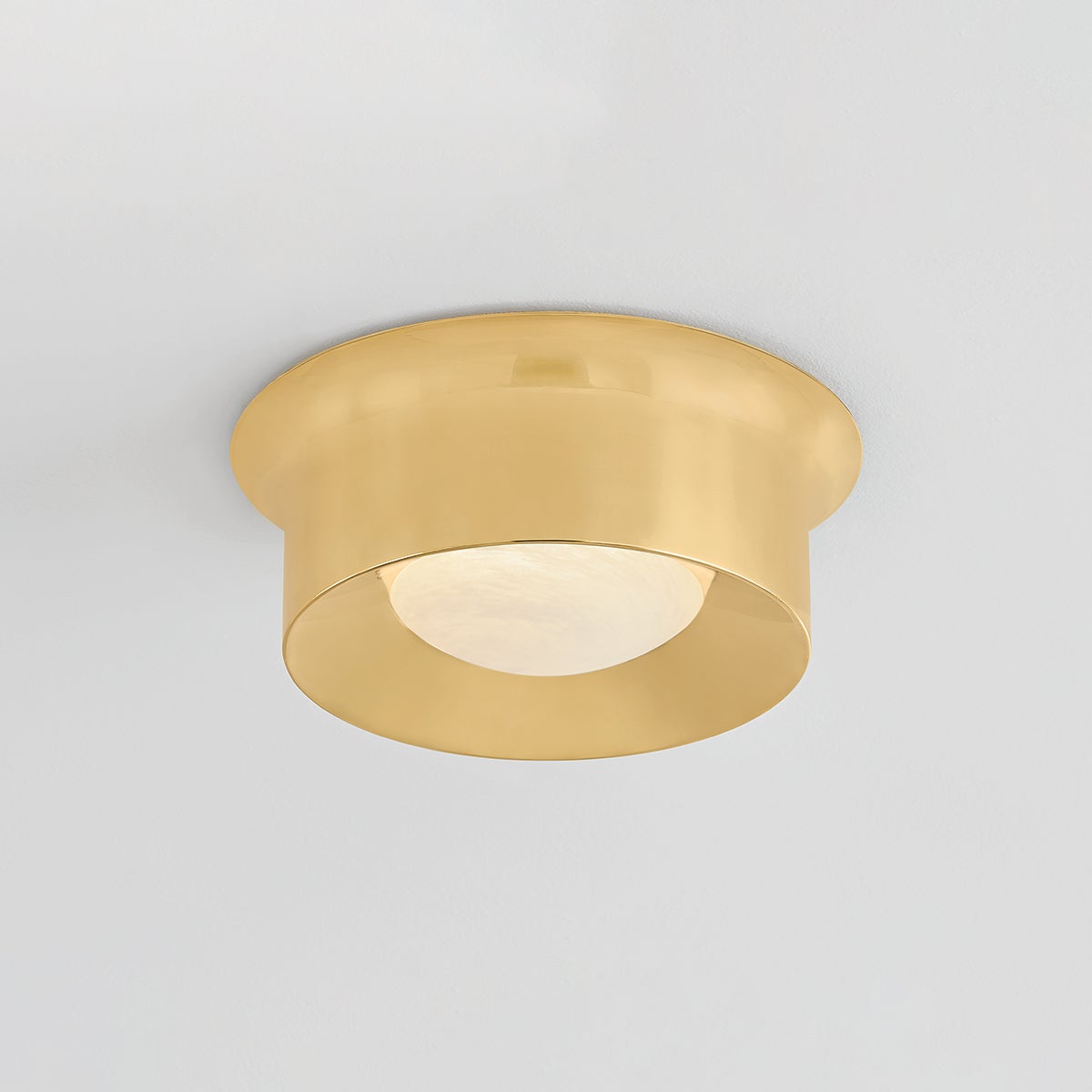 Close-up of the Noxon Flush Mount 13.75" in aged brass showing the shade profile and mounting canopy.