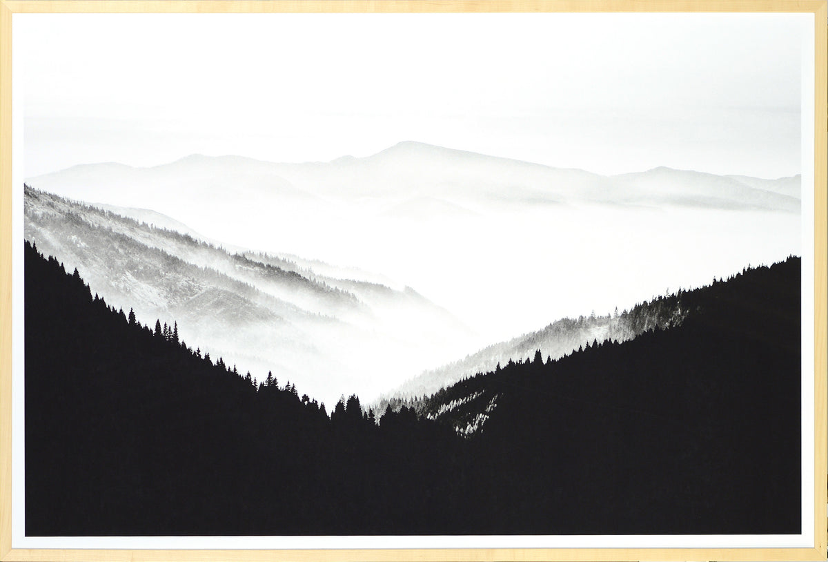 Northern Ridge wall art featuring a black and white mountain landscape with misty valleys