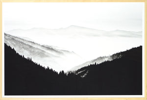 Northern Ridge wall art featuring a black and white mountain landscape with misty valleys