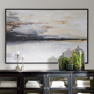 Warran canvas art displayed above a dark wooden cabinet with candles and plants.