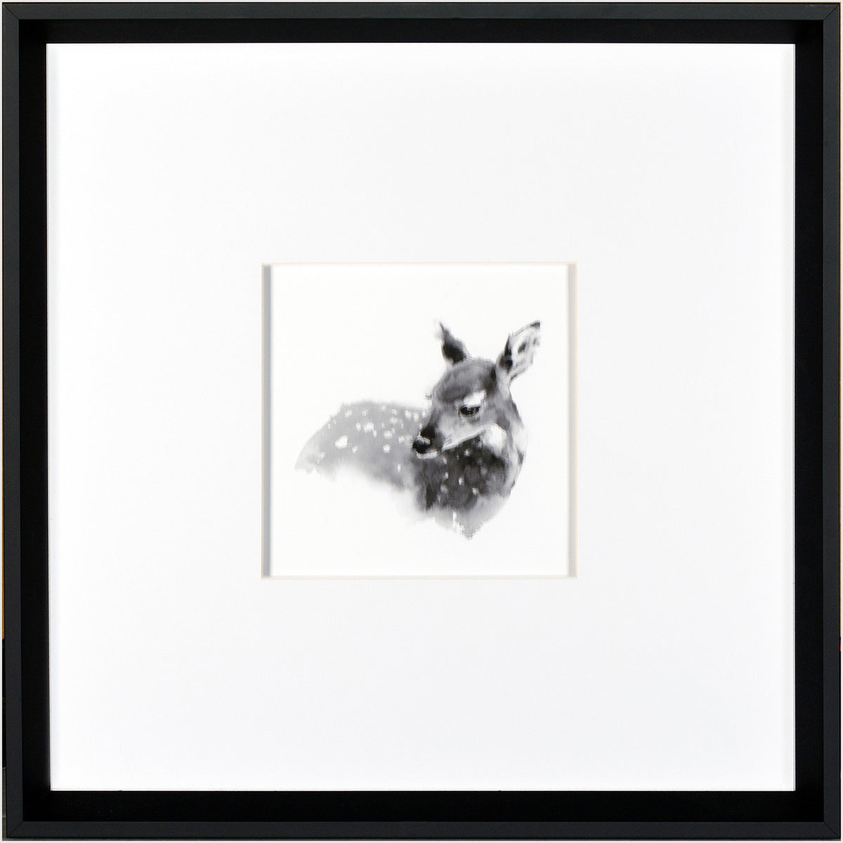 Fawn wall art featuring a black and white illustration of a deer in a black frame