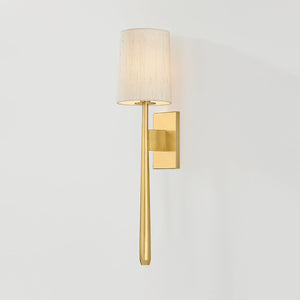 Close-up of the Bridgeton Wall Sconce in aged brass showing the arm curve and shade silhouette.
