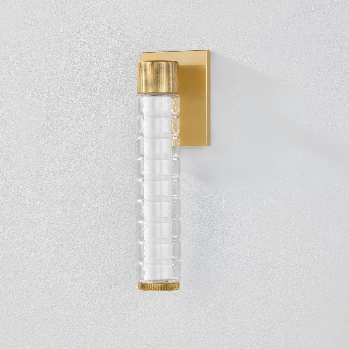 Castor Bath Sconce 4.25" x 13.5" in aged brass shown from a second angle to highlight the arm spread and shade silhouette.