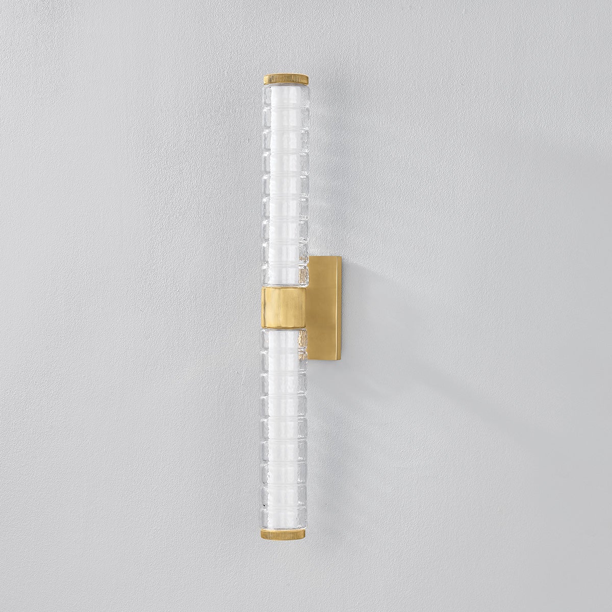 Castor Bath Sconce 4.25" x 24.25" in aged brass — a Hudson Valley bath and vanity for bathrooms and powder rooms at Laurie Yapp Home.