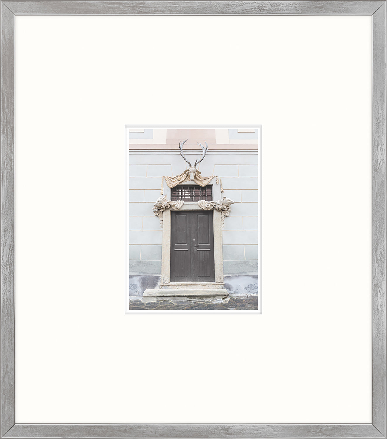 Pastel Revival Series XVI wall art featuring a decorative door with antlers and intricate stonework.