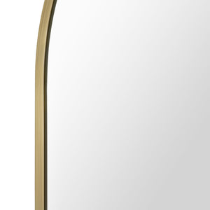 Close-up of Durness mirror's arched top, featuring a sleek gold frame and clear reflective surface.
