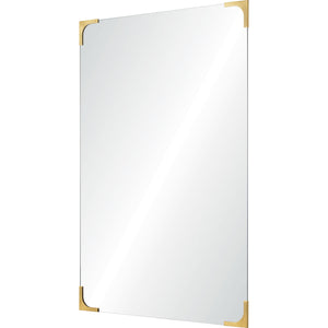 Eros mirror with polished brass corners, showcasing a clear reflective surface.