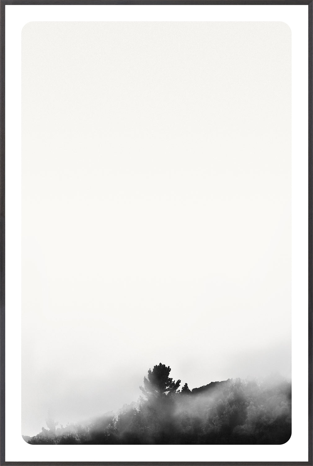 Genesis II wall art featuring a minimalist black and white landscape with fog and a silhouette of a tree.