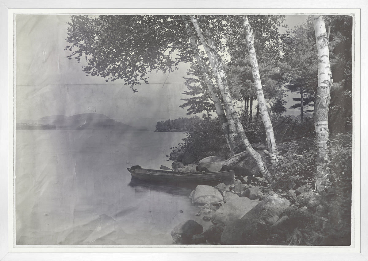 Indigo Stained – Lake George wall art featuring a serene lake view with a boat and trees.