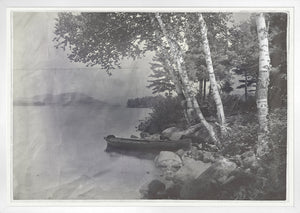 Indigo Stained – Lake George wall art featuring a serene lake view with a boat and trees.