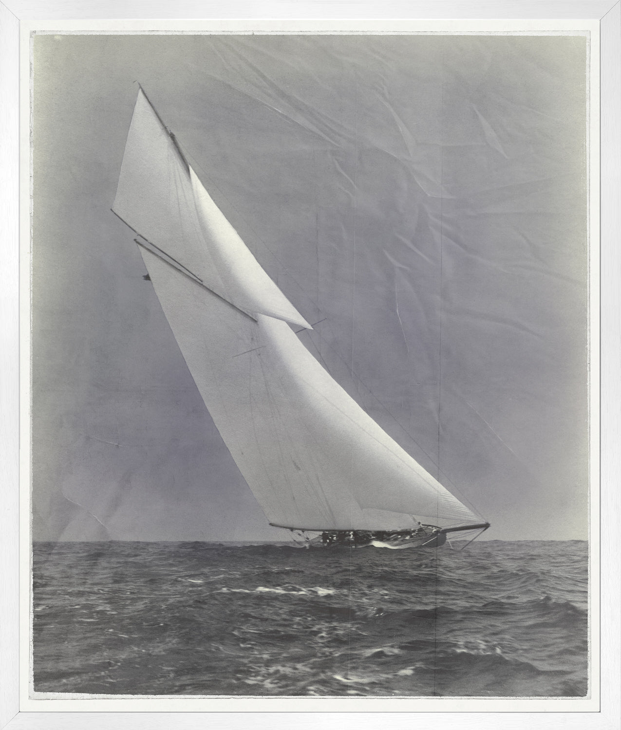 Indigo Stained – Yacht Columbia wall art featuring a sailboat with white sails on the ocean.