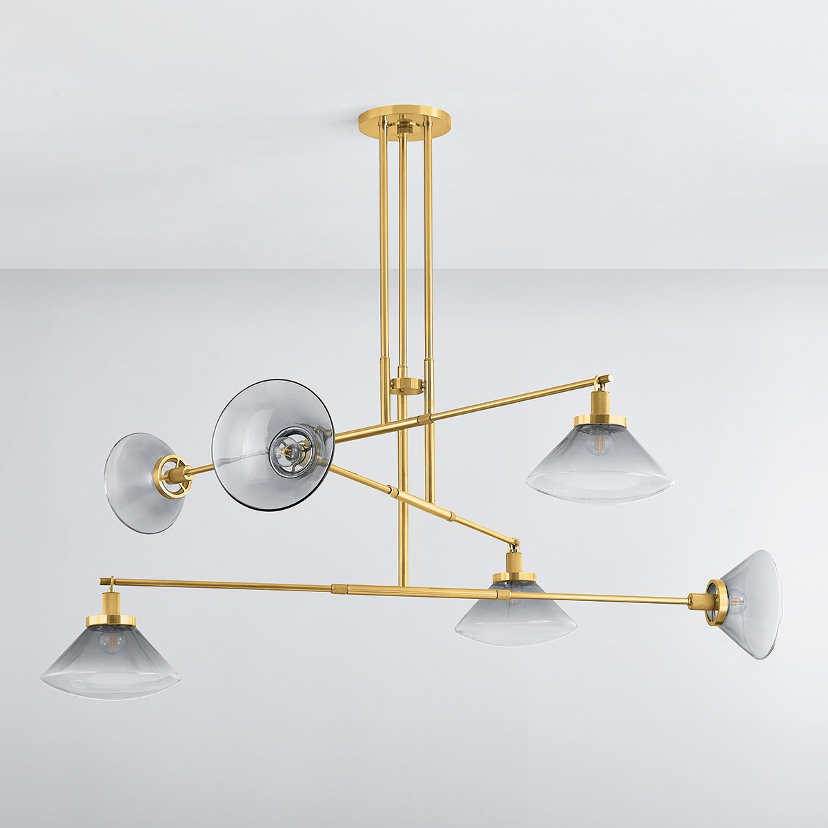 Mendon Chandelier in aged brass shown from a second angle to highlight the frame, arms, and shade detail.