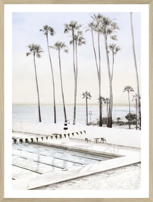 Ole Hanson Beach Club wall art featuring palm trees and a swimming pool near the ocean