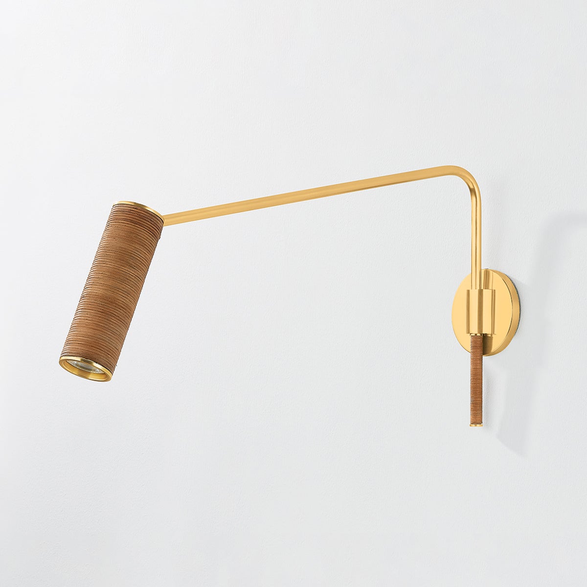 Narragansett Wall Sconce in aged brass shown from a second angle to highlight the arm curve and shade silhouette.