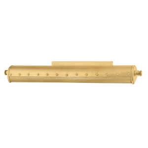 Close-up of the Gaines Picture Light in aged brass showing the arm curve and shade silhouette.