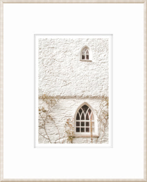 Masonry – Arched Windows wall art showcasing two arched windows on a white textured wall.