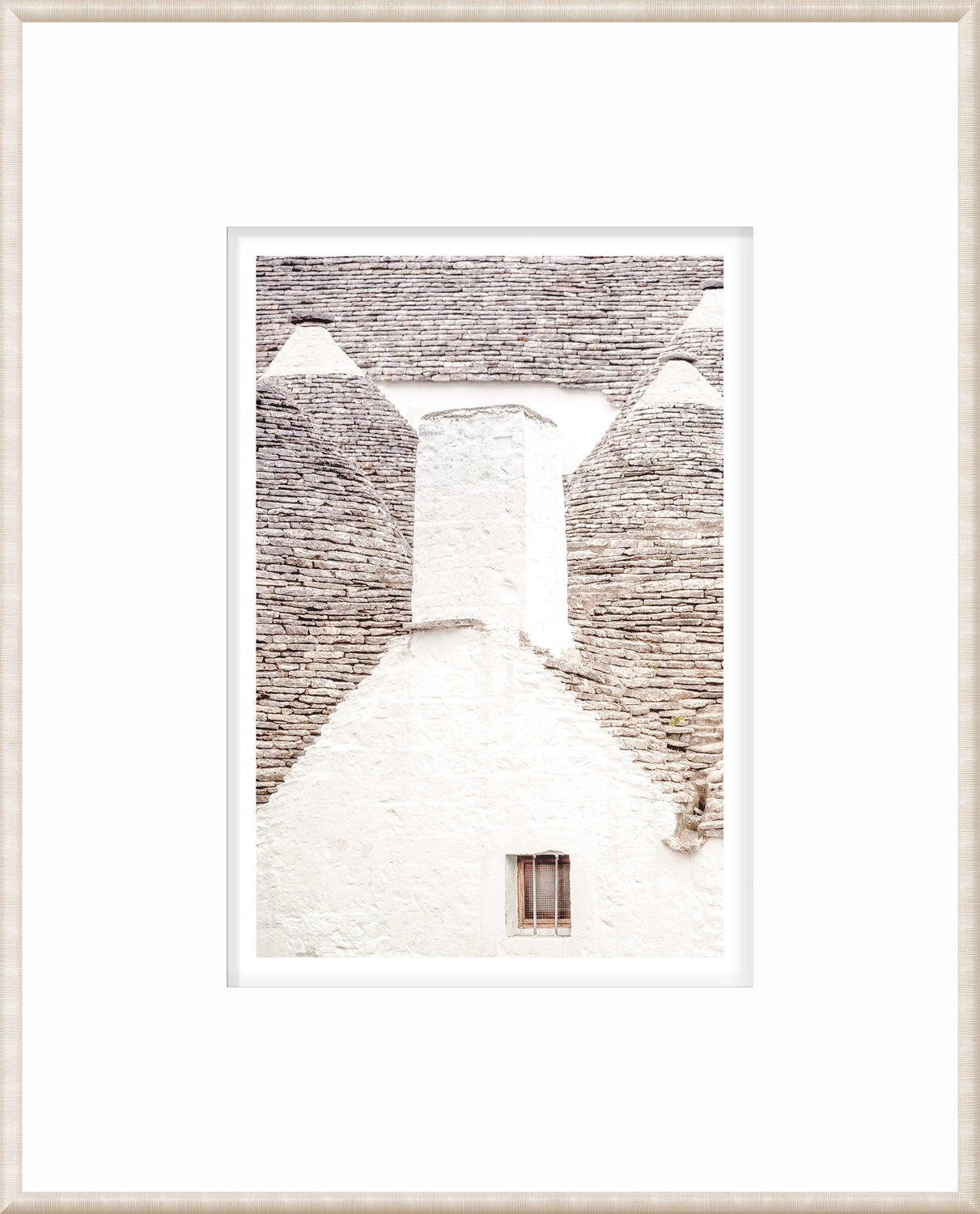 Masonry – Trullo Rooftops wall art showcasing a white stone wall and gray stone roof details.