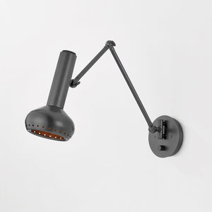 Close-up of the Roald Wall Sconce in dark bronze showing the arm curve and shade silhouette.