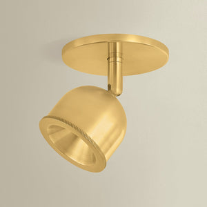 Tuthill Flush Mount in aged brass shown from the front to reveal the shade profile and mounting canopy.
