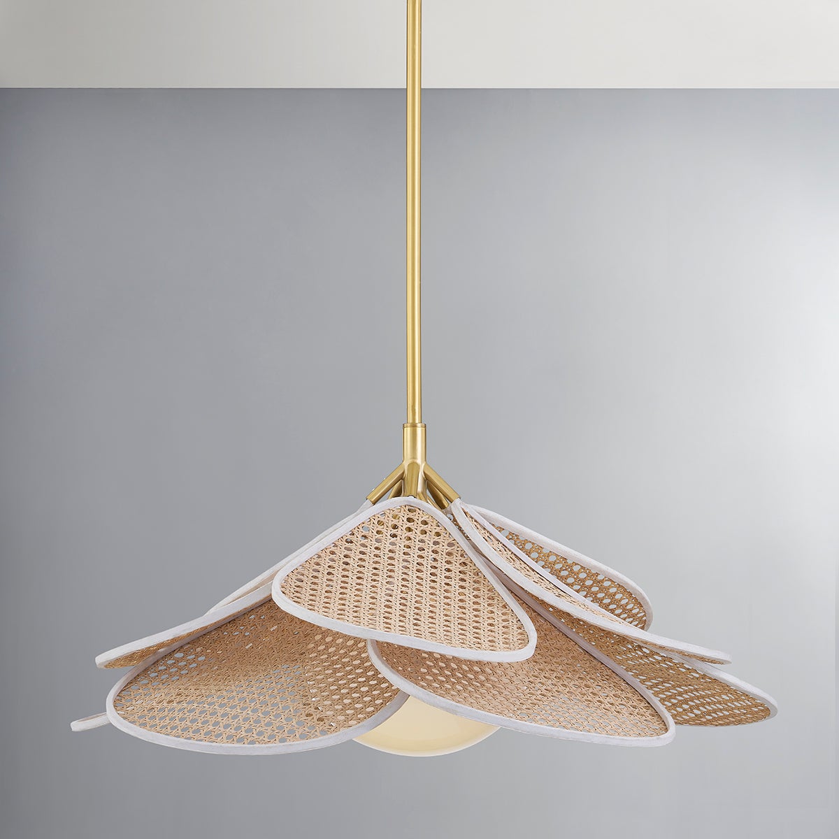 Florina Pendant 28" in aged brass shown from the front to reveal the shade shape and metal detail.