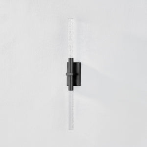 Close-up of the Millerton Wall Sconce showing the arm curve and shade silhouette.