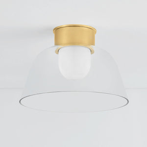 Lakeside Flush Mount 14" in aged brass shown from the front to reveal the shade profile and mounting canopy.