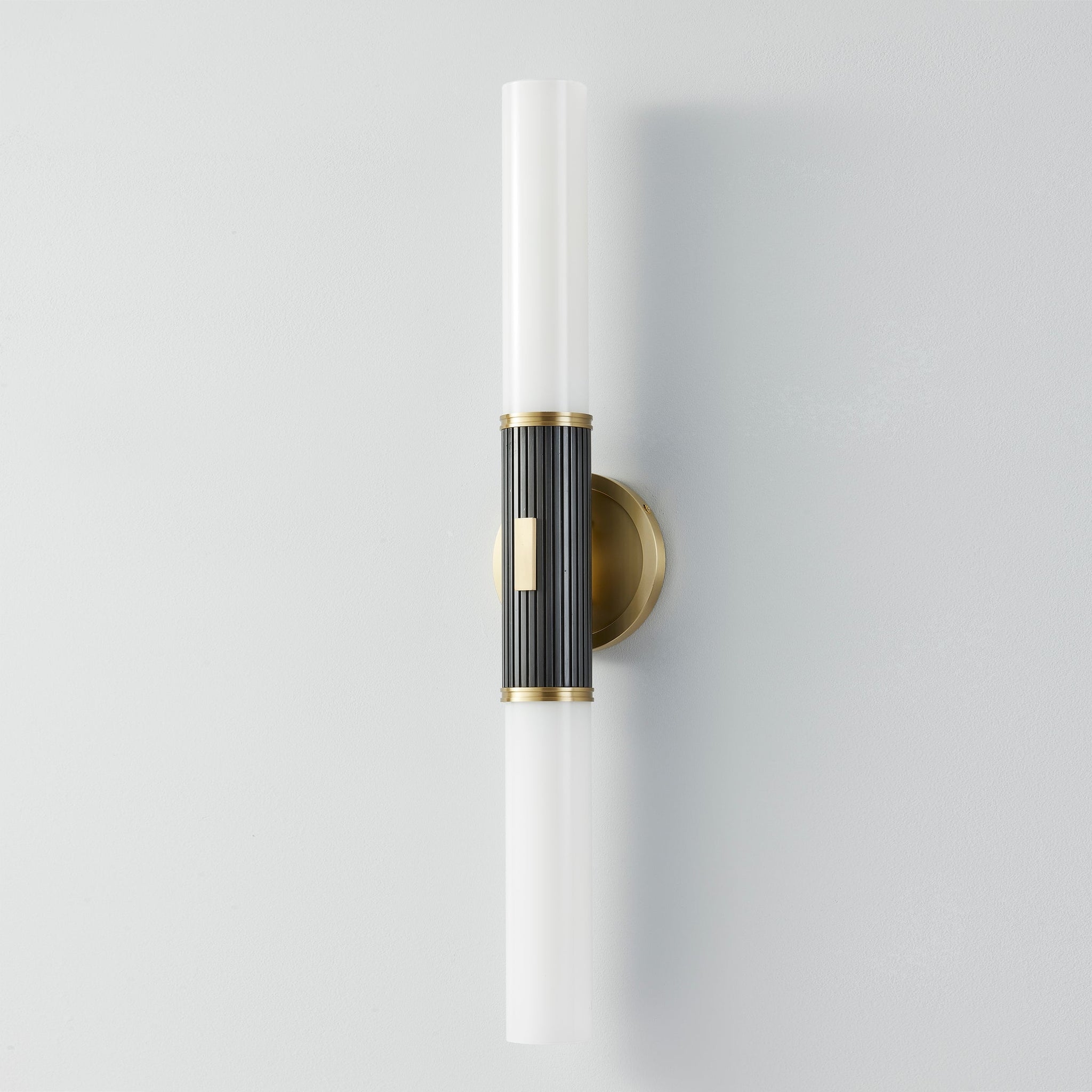 Close-up of the Crewe Wall Sconce 5" x 26.25" showing the arm curve and shade silhouette.