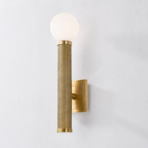 Close-up of the Pienza Wall Sconce 5.5" x 20" showing the arm curve and shade silhouette.