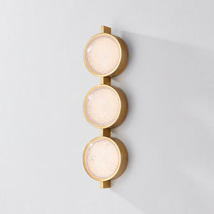Ansonia Wall Sconce shown from the front to reveal the arm curve and shade silhouette.