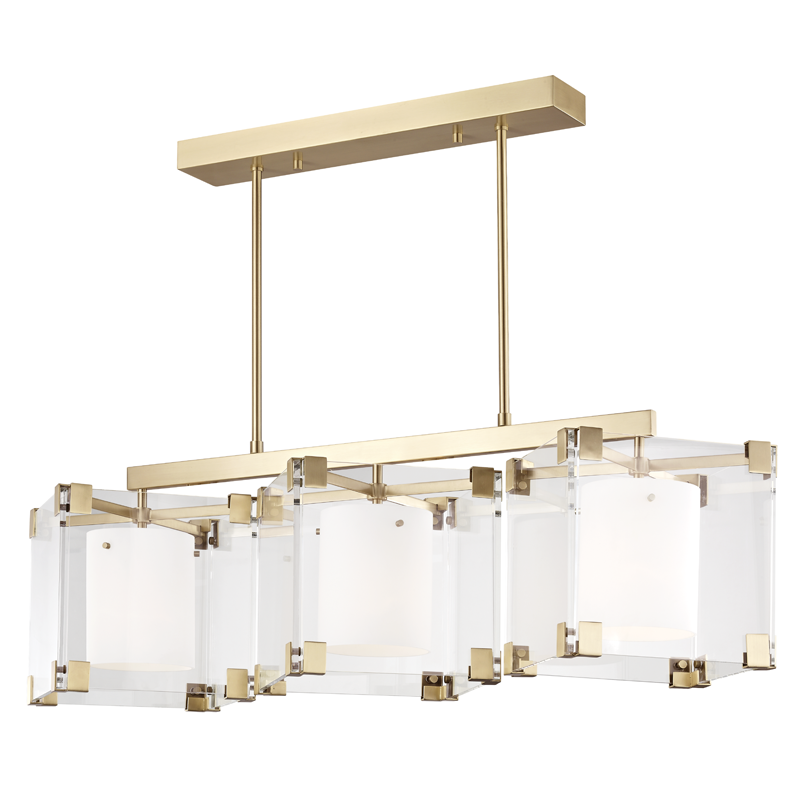 Achilles Linear in aged brass — a Hudson Valley linear for dining rooms, kitchen islands, and long consoles at Laurie Yapp Home.