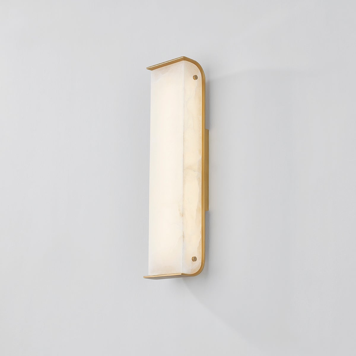Hera Wall Sconce 4.25" x 18" shown from the front to reveal the arm curve and shade silhouette.