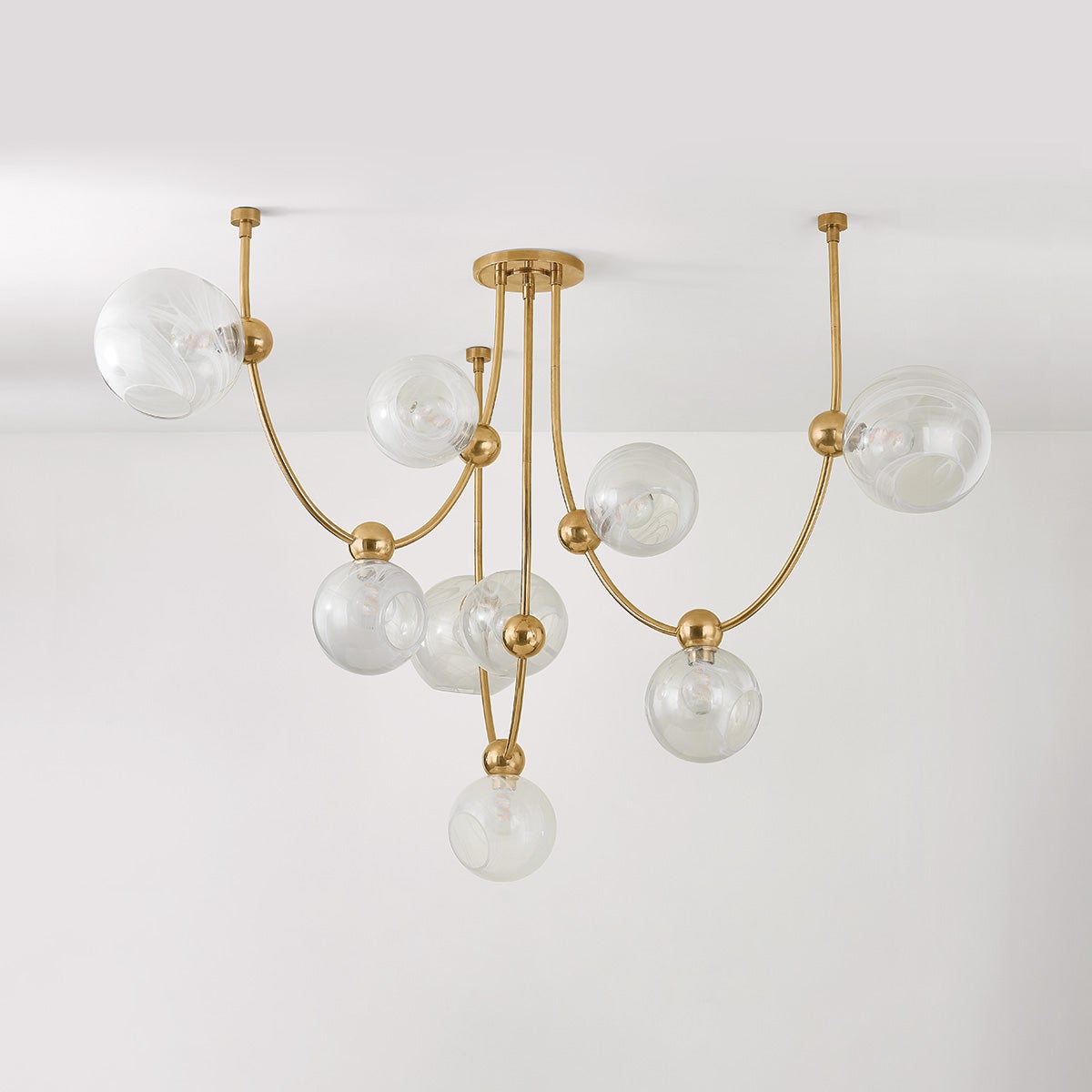 Astraia Chandelier — a Corbett chandelier for dining rooms, entries, and living rooms at Laurie Yapp Home.