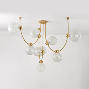 Astraia Chandelier shown from a second angle to highlight the frame, arms, and shade detail.