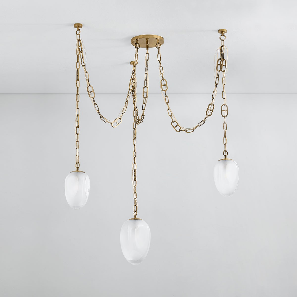 Daith Chandelier 48" — a Corbett chandelier for dining rooms, entries, and living rooms at Laurie Yapp Home.