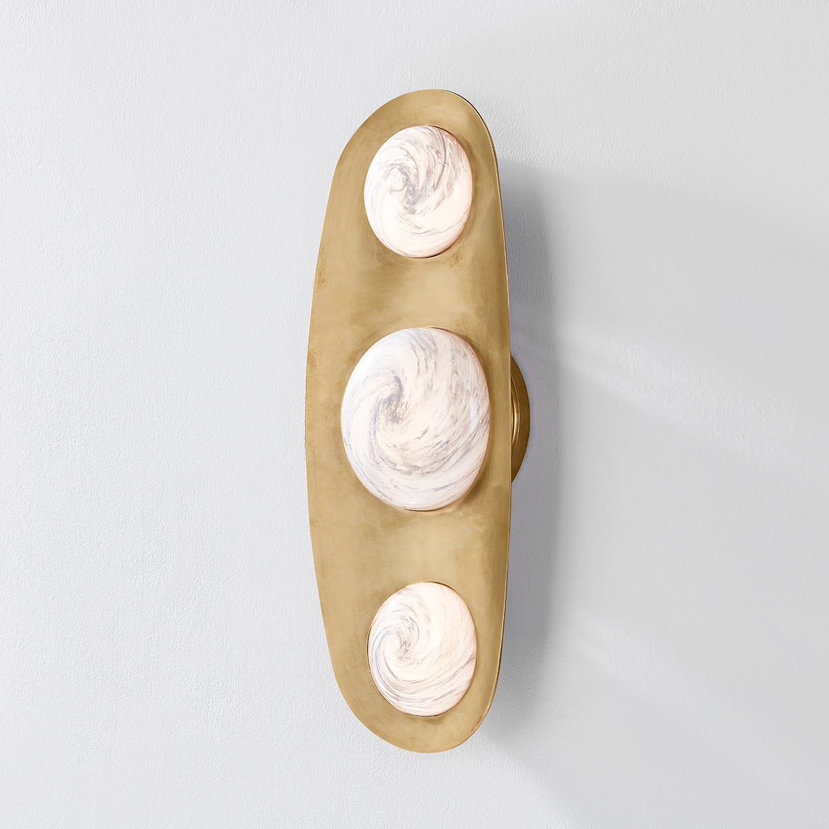 Close-up of the Bezel Wall Sconce 7" x 18" showing the arm curve and shade silhouette.