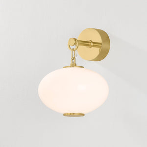 Close-up of the Nephele Wall Sconce showing the arm curve and shade silhouette.