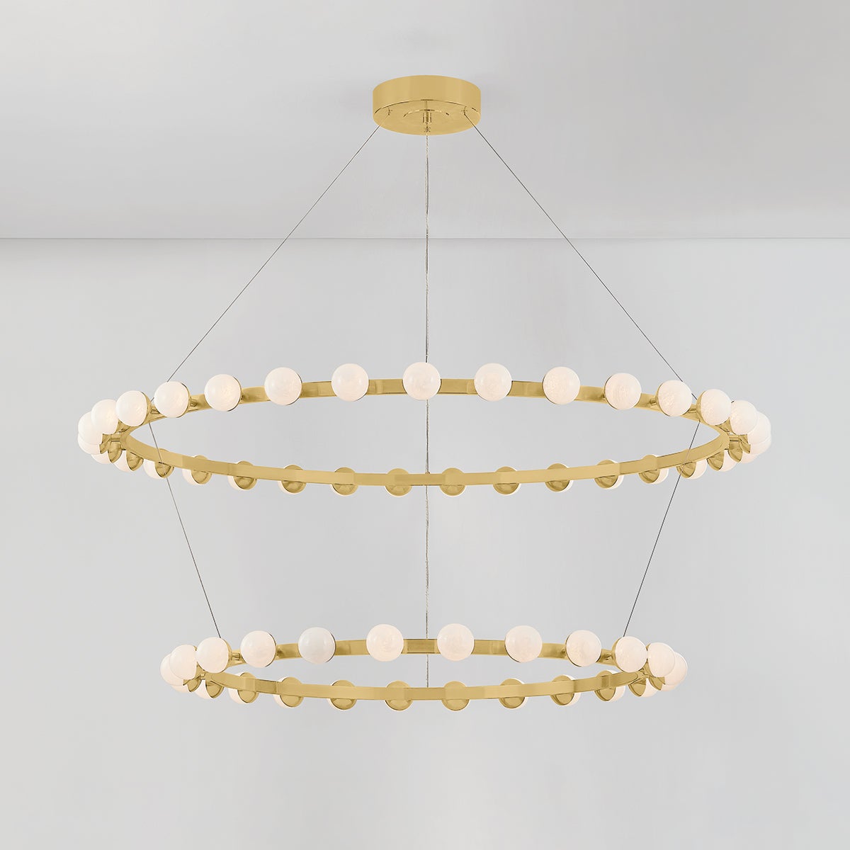 Linus Chandelier 61" x 12.5" shown from the front to reveal the frame, arms, and shade detail.