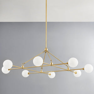 Andrews Chandelier in aged brass shown from a second angle to highlight the frame, arms, and shade detail.