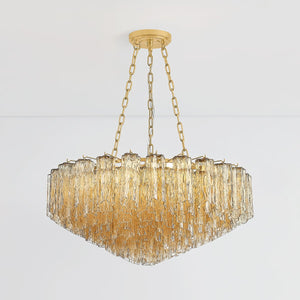 Close-up of the Watertown Chandelier 33" in aged brass showing the frame, arms, and shade detail.