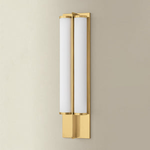 Northfield Wall Sconce 5.5" in aged brass shown from a second angle to highlight the arm curve and shade silhouette.