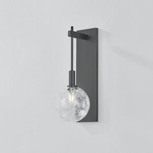 Close-up of the Onteora Wall Sconce in dark bronze showing the arm curve and shade silhouette.