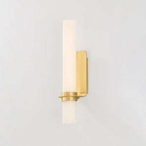 Groveland Station Wall Sconce 4.75" x 18" in aged brass shown from the front to reveal the arm curve and shade silhouette.