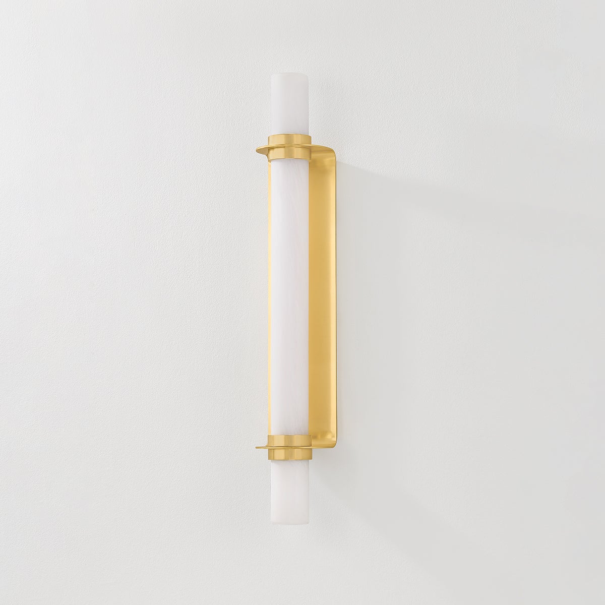 Groveland Station Wall Sconce 4.75" x 27.75" in aged brass shown from a second angle to highlight the arm curve and shade silhouette.